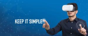 Man with VR headset interacting with graphic and text keep it simple