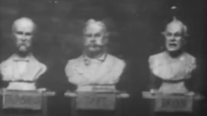Three sculpted heads on plinths