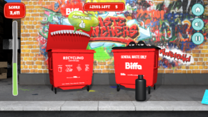 Biffa Waste munchers gameplay, the Recycling Bin and the General waste bin against a graffiti-d wall, with the Recyling bin's mouth open and the text bubble saying 'Awesome' coming out