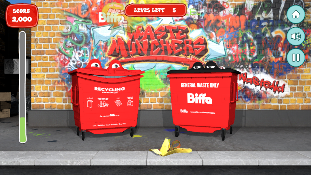 Two waste bins from the Biffa waste munchers game, one of them smiling with a banana peel in front of them