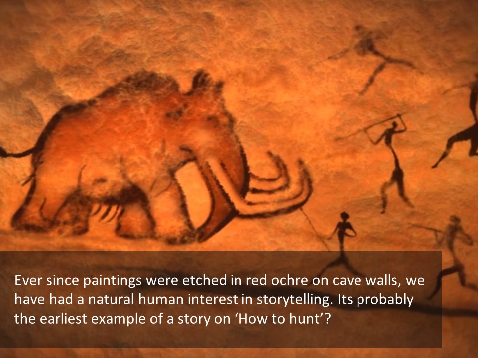 A cave painting of people hunting a mammoth with the text 'Ever since paintings were etched in red ochre on cave walls, we have had a natural human interest in storytelling. Its probably the earliest example of a story on 'How to Hunt'?'