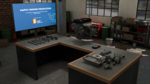 A VR car garage environment with car parts on a table, an engine hanging over the table and a screen that says Haptic Engine Production at the end of the table