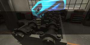 Virtual Reality Training engine building. A virtual reality hand is holding one of the components