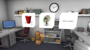 A fire safety virtual reality training. An office environment has two desks with computers, chairs, and bookshelves filled with books and boxes. In the centre of the scene, three floating icons are displayed: one of a red trash can, one of a table fan, and one with the text 'Add an object.'