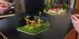 Two people playing an AR climate change game