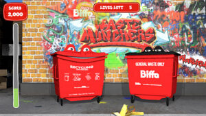 A game screen showing two bins, down a graffiti alley, with a graphic in the top left showing a score and a lives left indicator in the middle of the screen