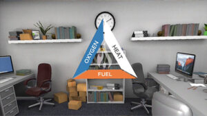 A VR office environment with a graphic of a 'fire triangle' symbol in the centre